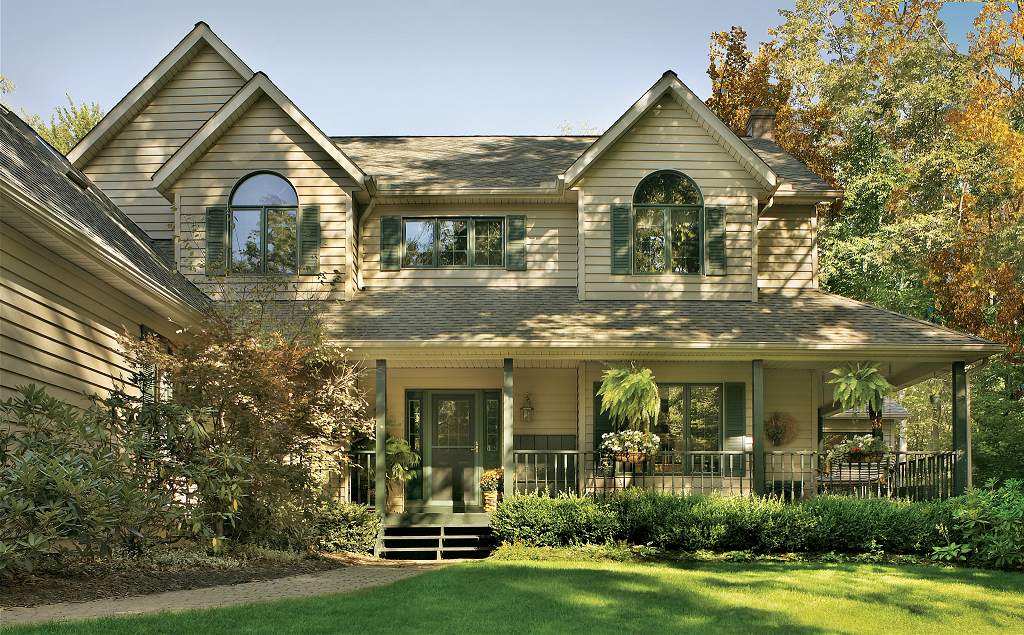 A large house with many windows and doors.