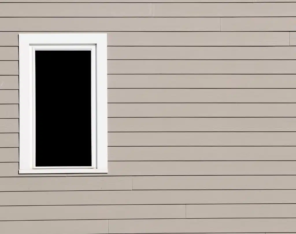 A window in the side of a house.