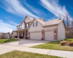 Greenway Exteriors team preparing a Wichita home for siding installation