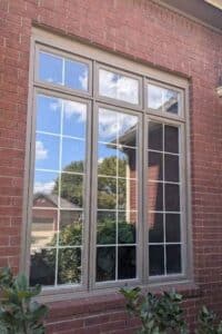 Greenway Exteriors team performing window replacement in Wichita home