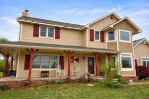 Fiber cement siding and replacement window installation completed on Wichita, KS home by Greenway Exteriors